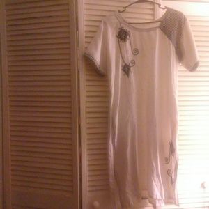 White and black kurta.